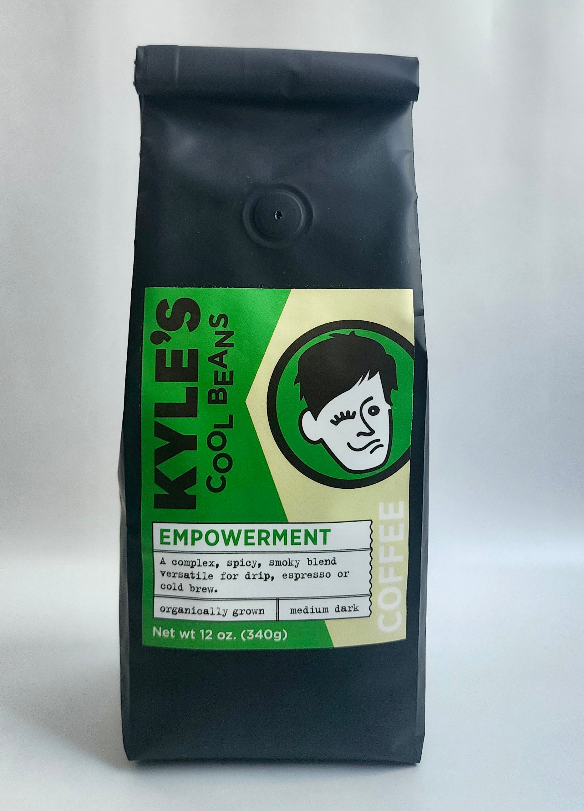 A picture of the front of an Empowerment coffee bag. The bag is smooth and the label is on the front of the bag, it is made of paper.